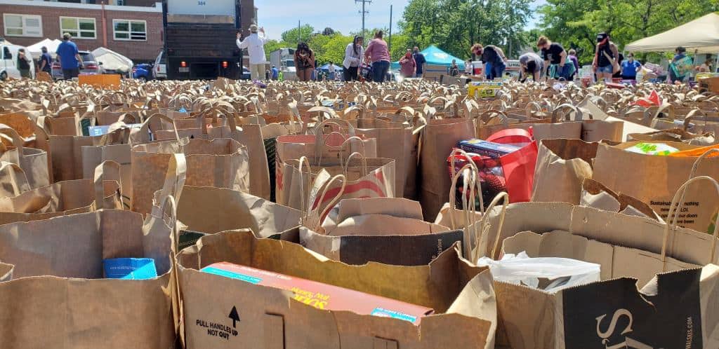 More food donations kept coming in throughout the day, even as operations shifted to allow people in need to pick up food.