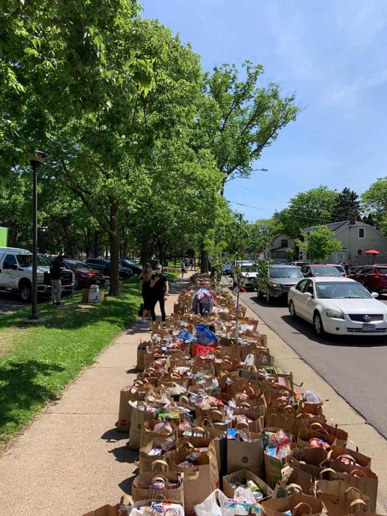 Lines of cars quickly formed in the morning bringing in piles of donations.