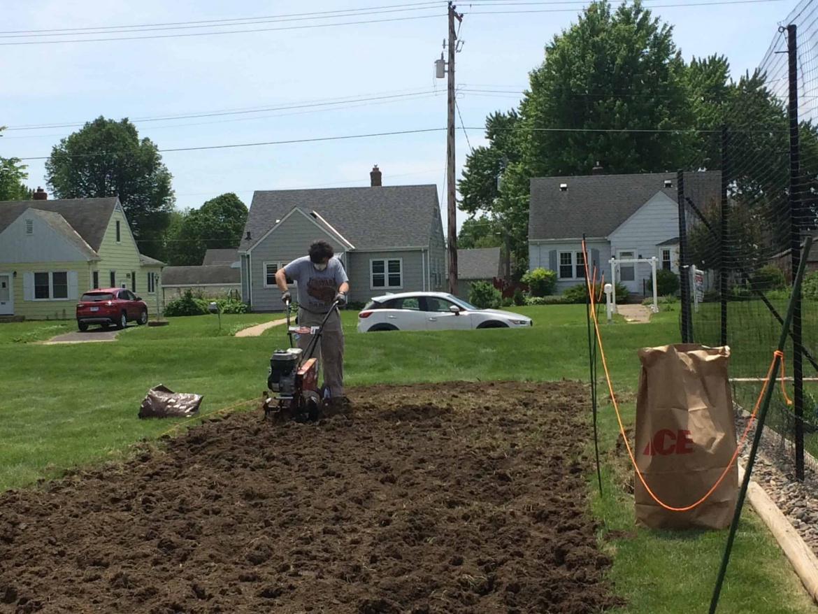 New Life Presbyterian Church garden partnership - tilling the garden