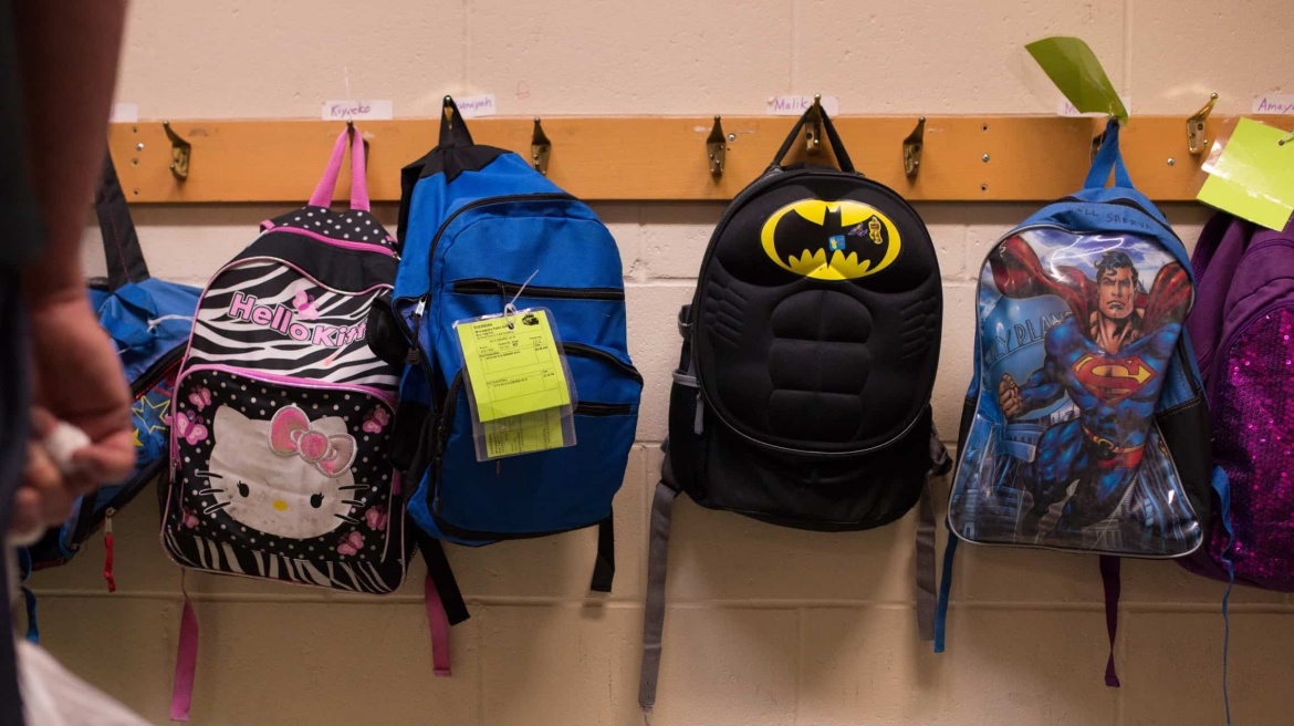 Backpacks on wall