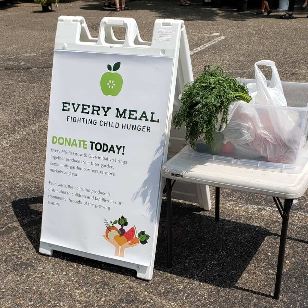 Produce donation stand at Northeast Farmers Market