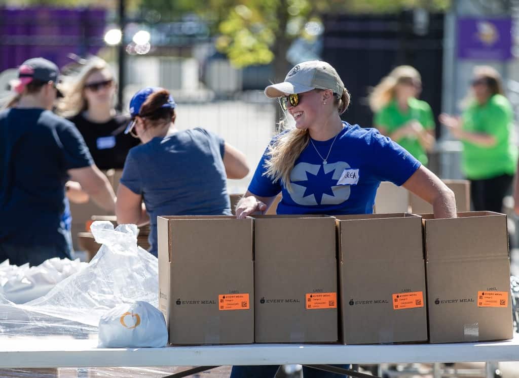 Polaris volunteers prep and label boxes