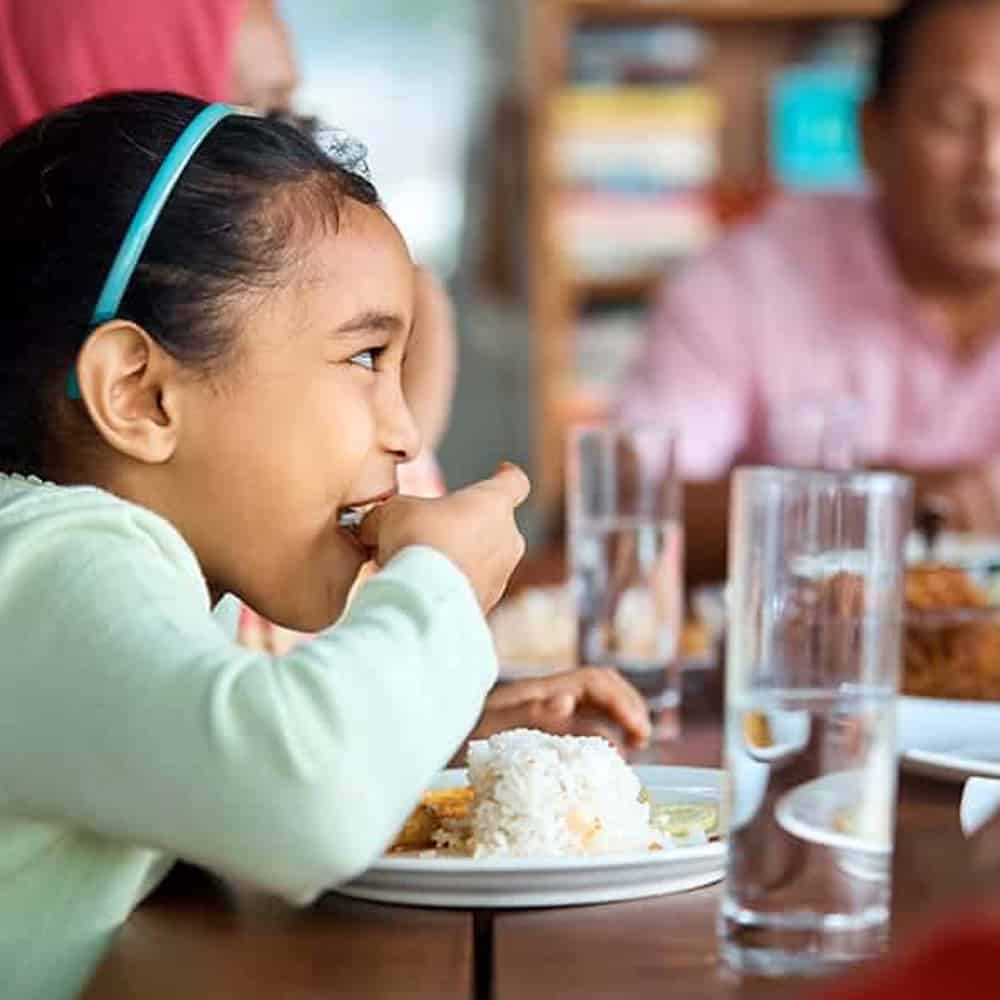 Mission and Vision Every Meal Child Eating At Dinner Table