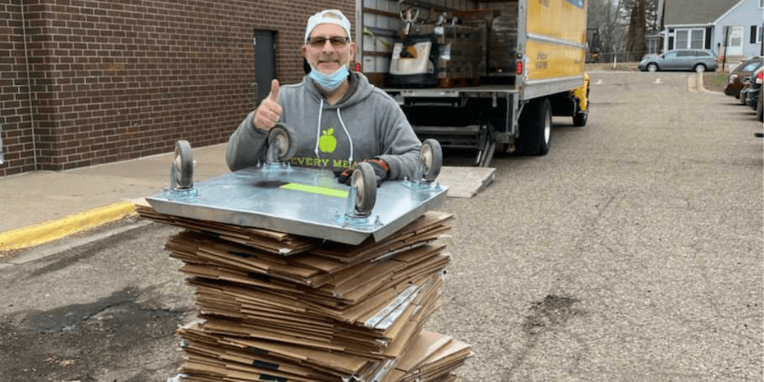 Joe Skelly delivering food at a school