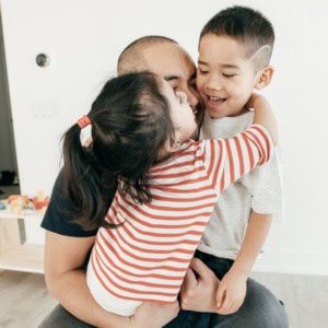 Annie and Lee hugging father